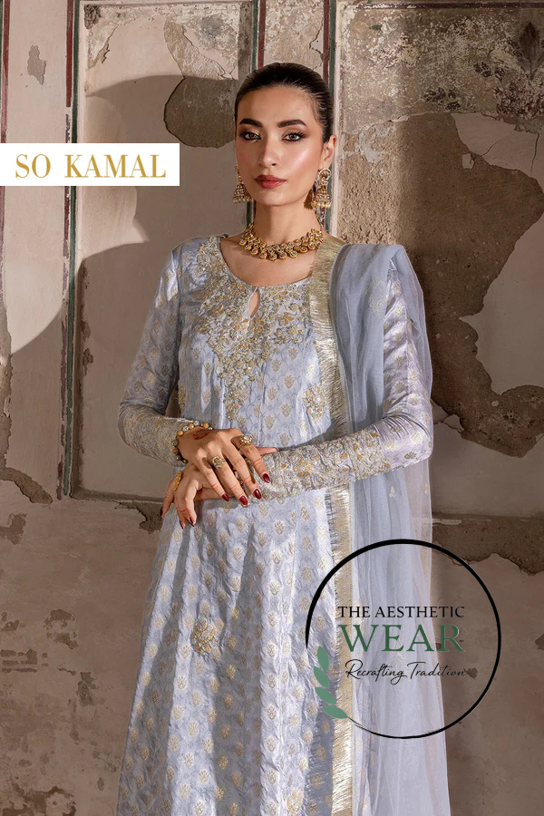 Ice blue zari jamawar suit with embroidered peshwas and embellished sleeves by So Kamal.