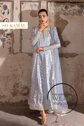 Ice blue zari jamawar suit displayed by model in elegant pose with detailed embellishments.